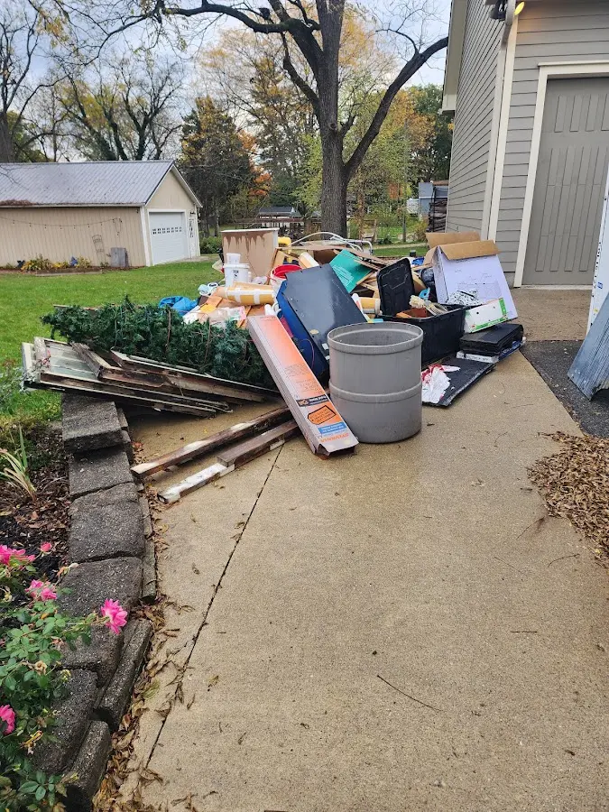 Dumpster being loaded with debris for Residential Dumpster Rental in Pleasure Point